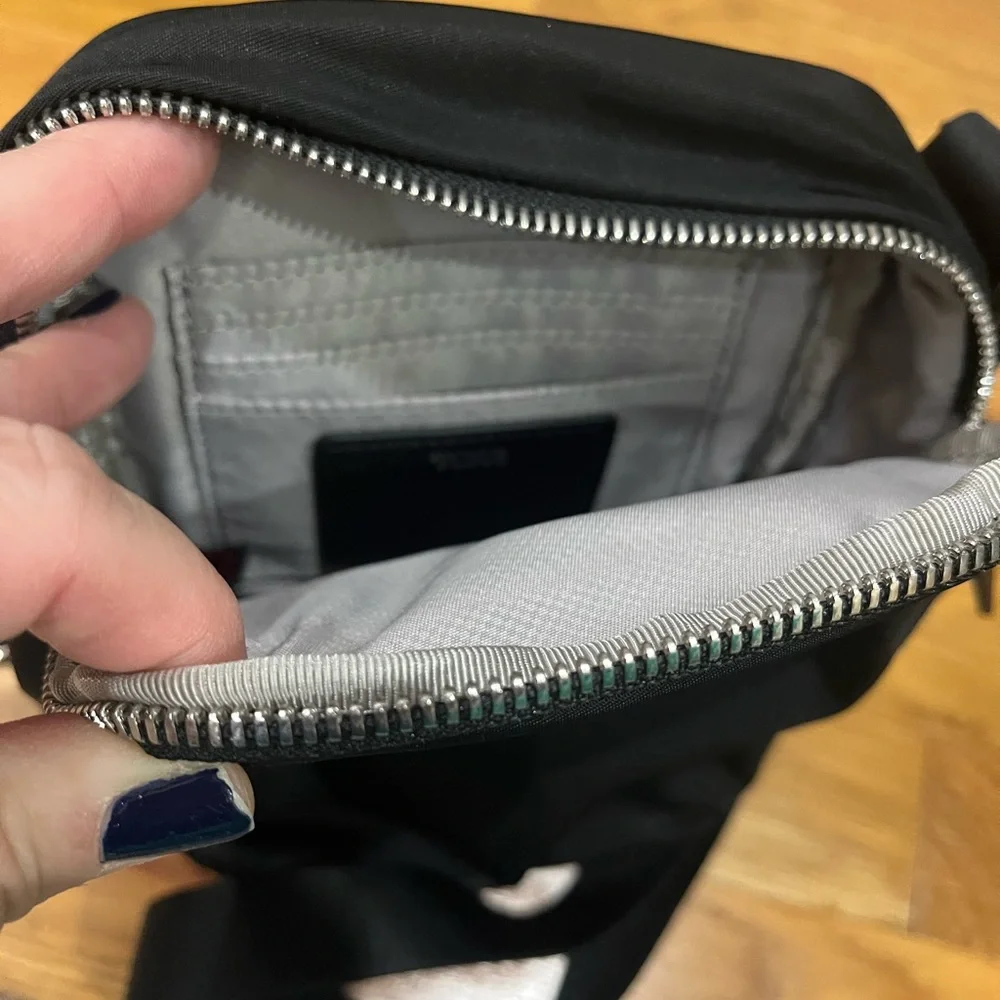 Tumi Black Crossbody Bag with Silver Hardware